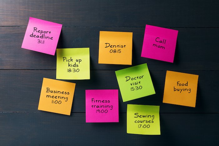 Colorful Sticky Notes With A Busy Schedule On Each