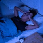 Woman frustrated cannot sleep due to Perimenopause