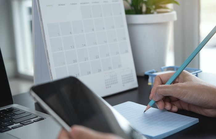 Business Woman'S Hand With Pencil Writing Note, Planning Daily Appointments